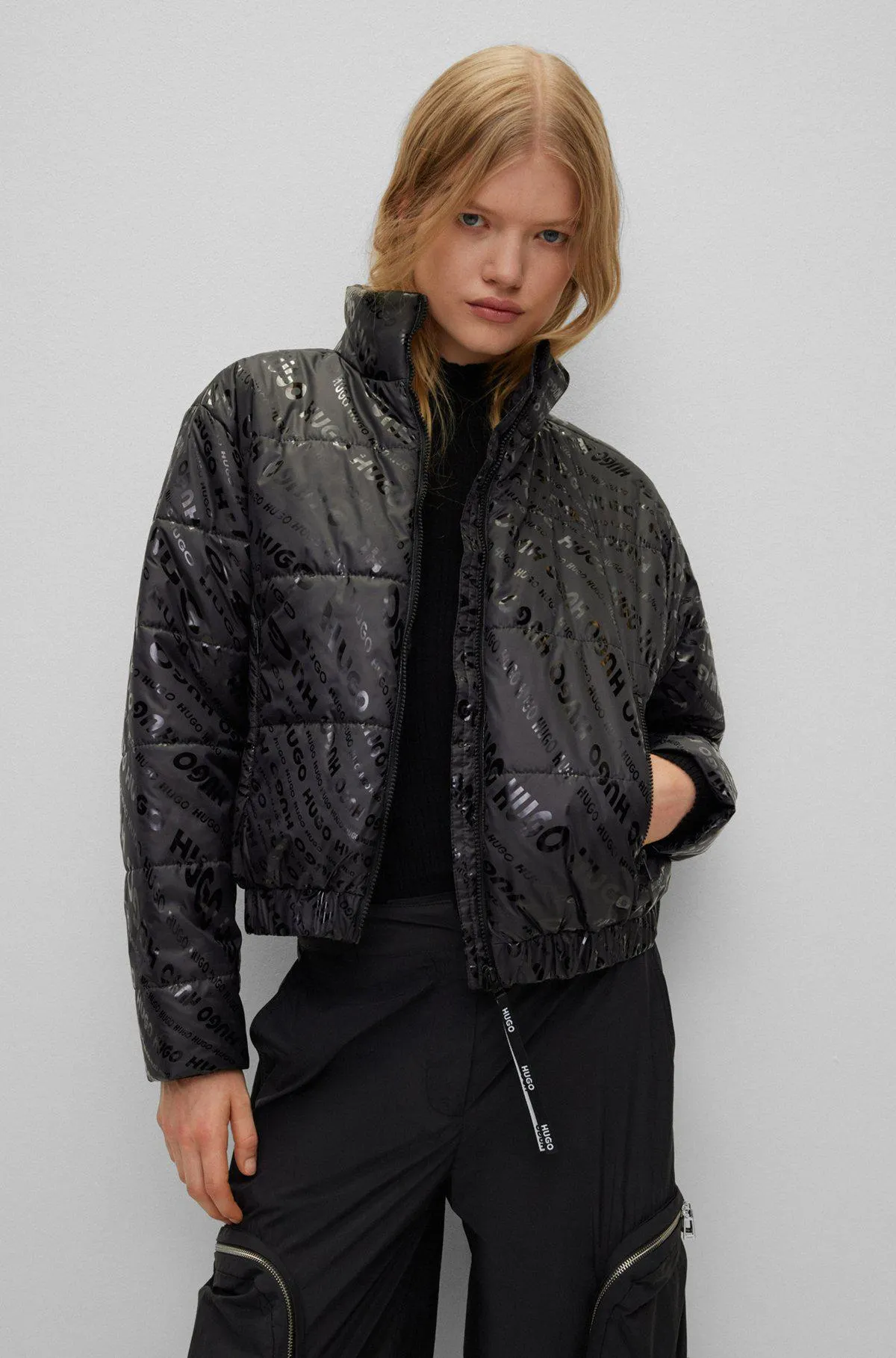 Relaxed-fit puffer jacket with all-over logos