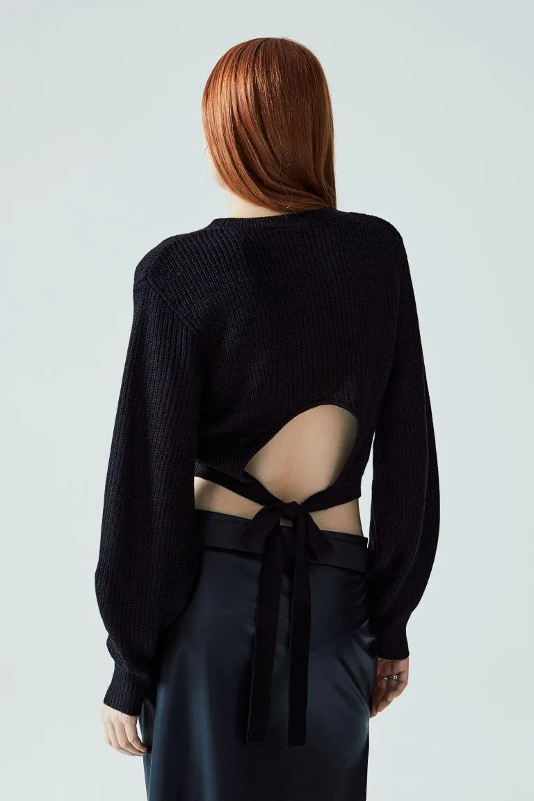 Genser med åpen rygg