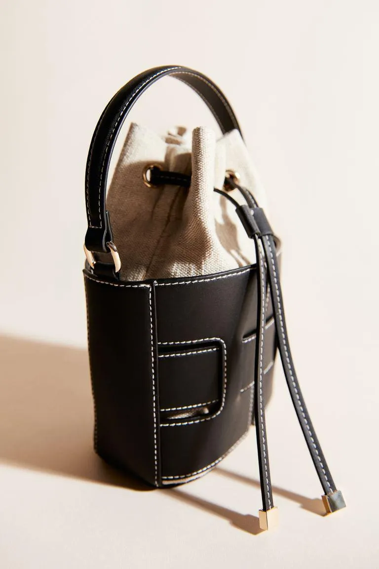 Crossbody-bøtteveske