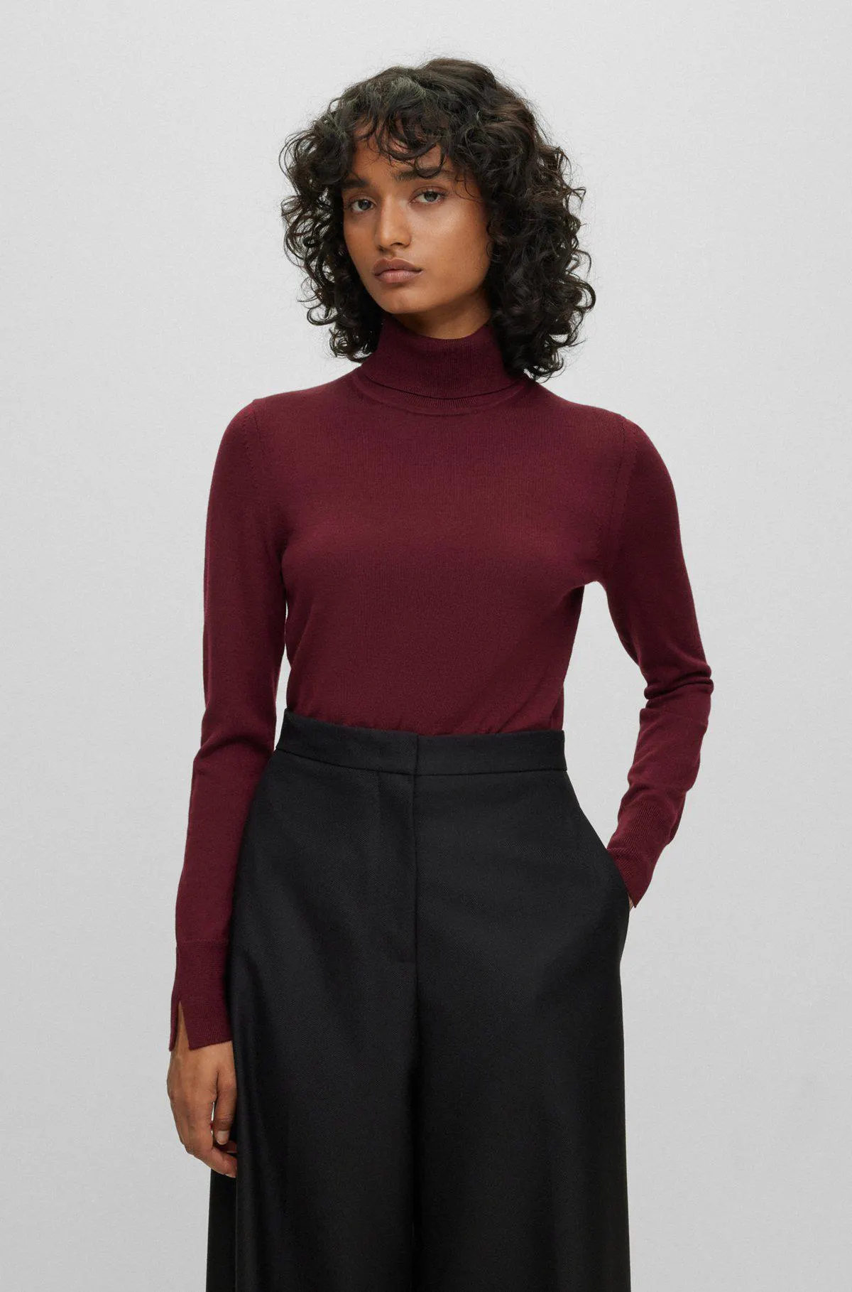 Rollneck sweater in virgin wool