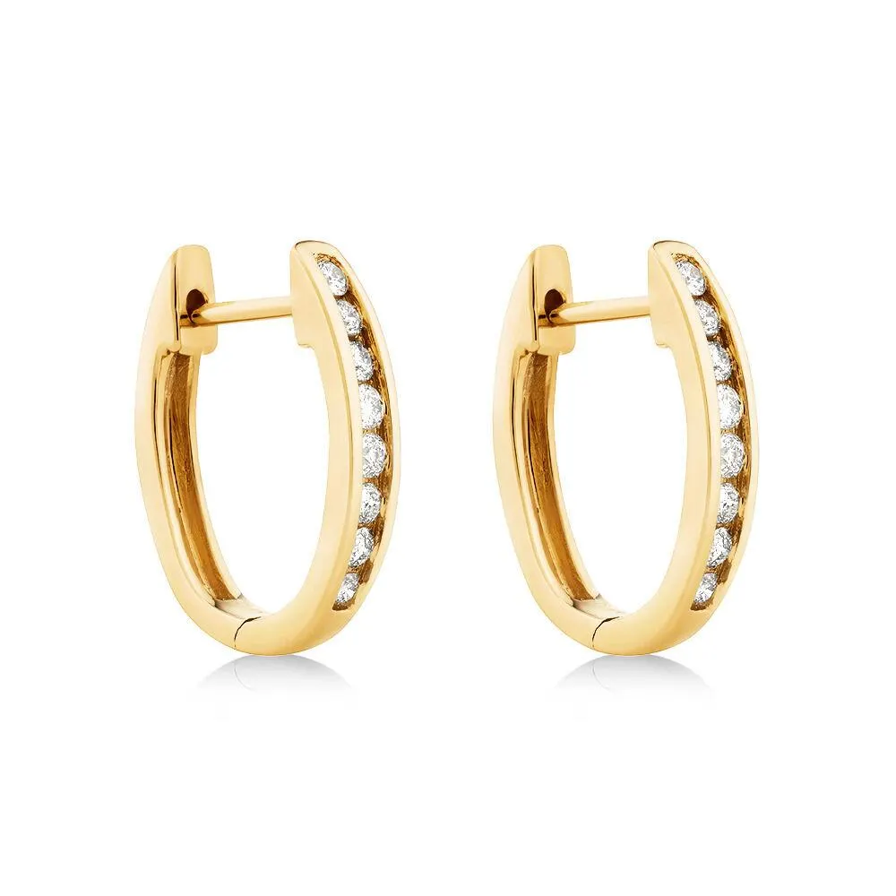 Huggie Earrings with 0.25 Carat TW of Diamonds in 10kt Yellow Gold