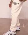 Baggy Leisure Club Cuffed Track Pants in White