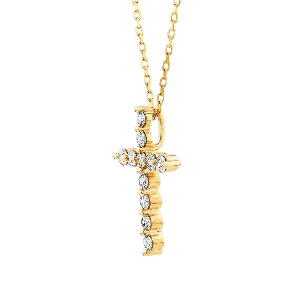 0.25 Carat TW Diamond Cross Pendant in 10kt Yellow Gold