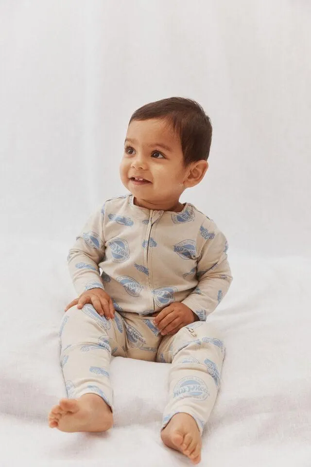 The Long Sleeve Zip Romper License