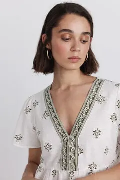 Camisa peplum detalles escote