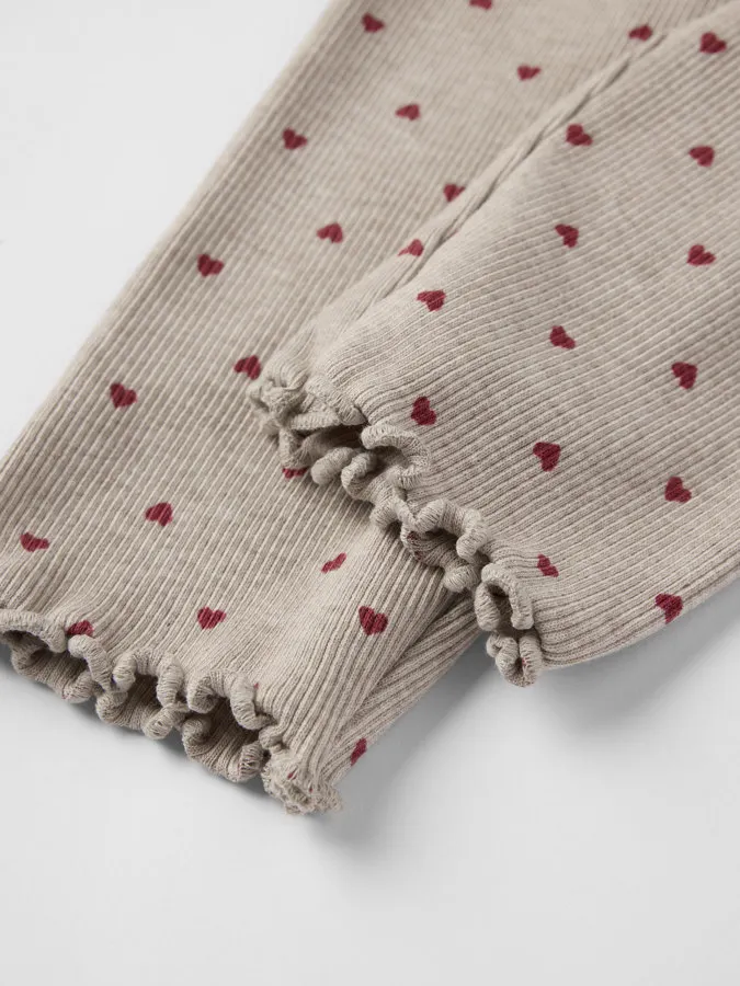 Ribbestrikket i myk bomull med bølget kant