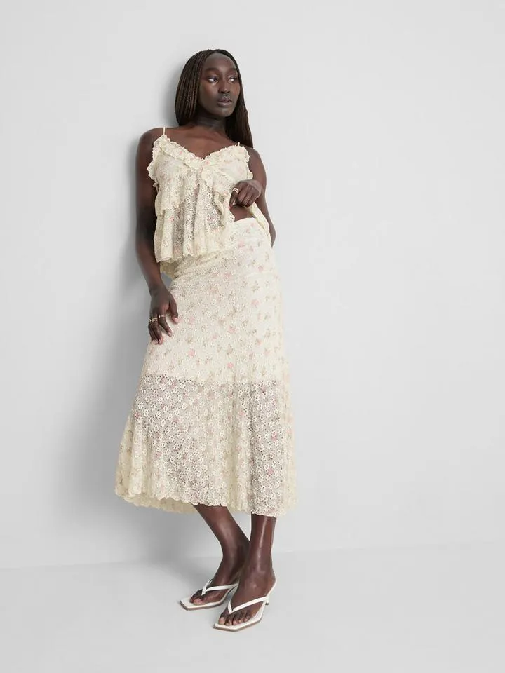 Jupe mi-longue en coton mélangé texturé à fleurs