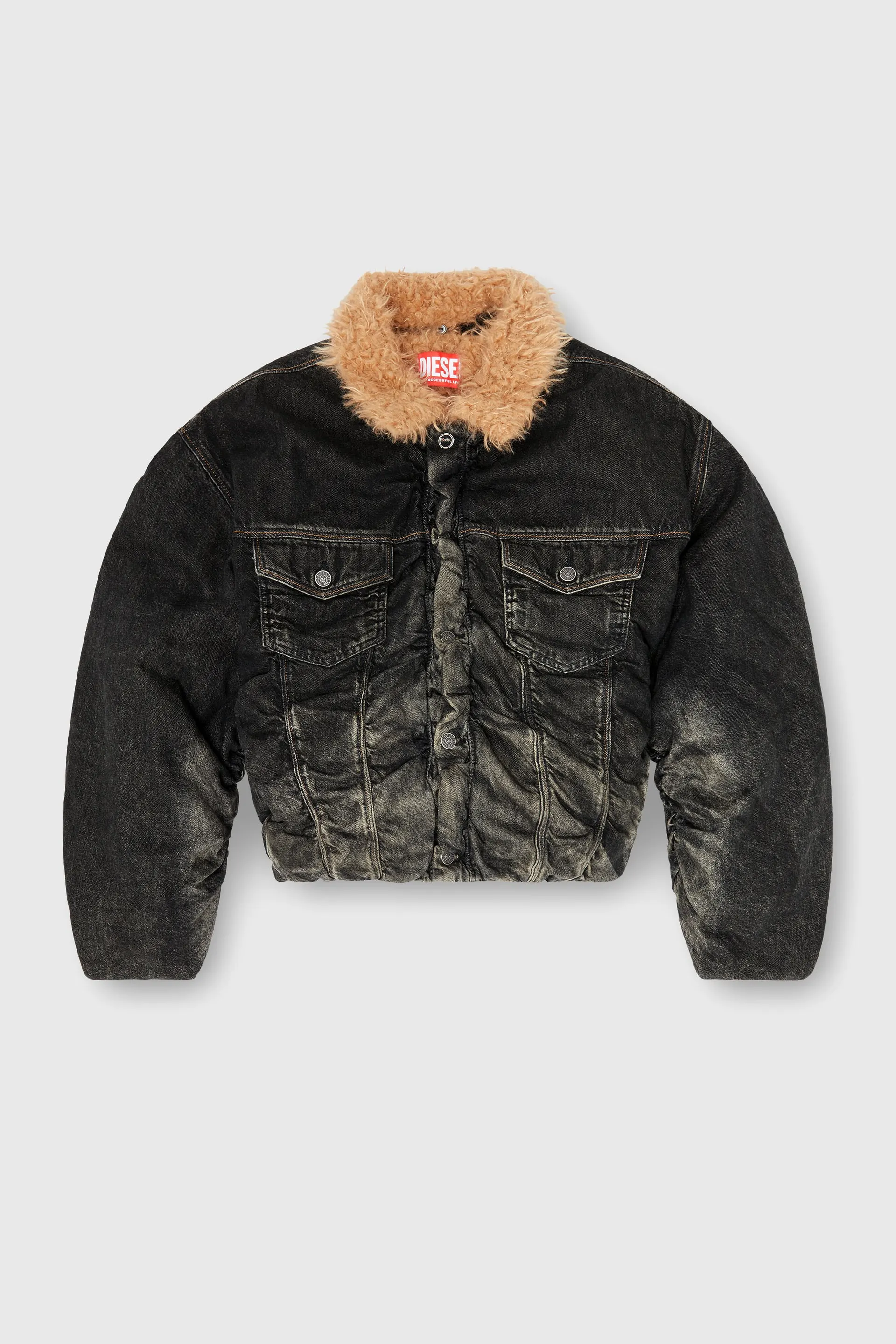 Teddy-lined trucker jacket in dirty-effect denim