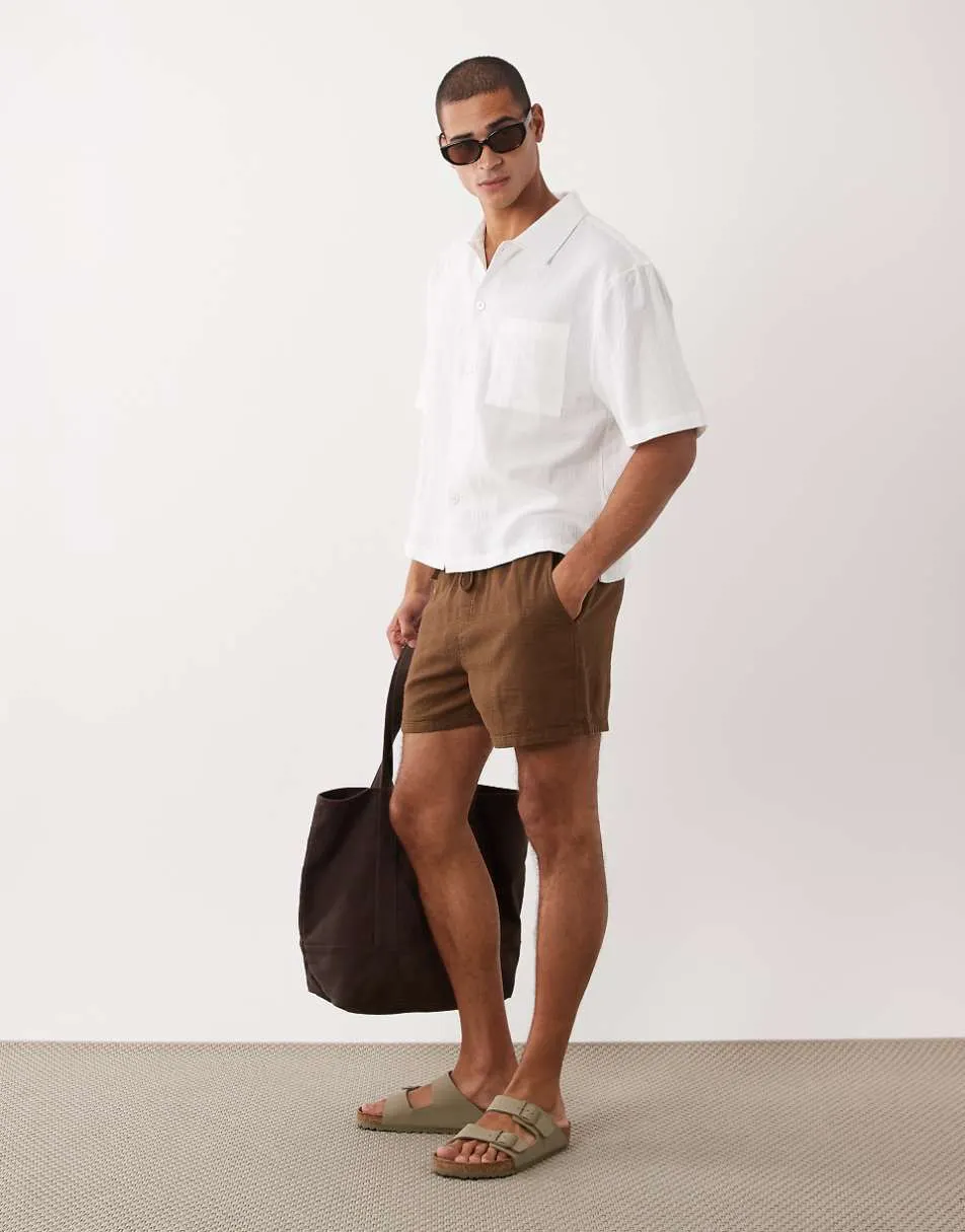 ASOS DESIGN wide textured shorts in short length in brown with elasticated waistband
