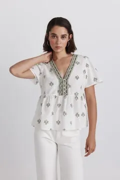 Camisa peplum detalles escote