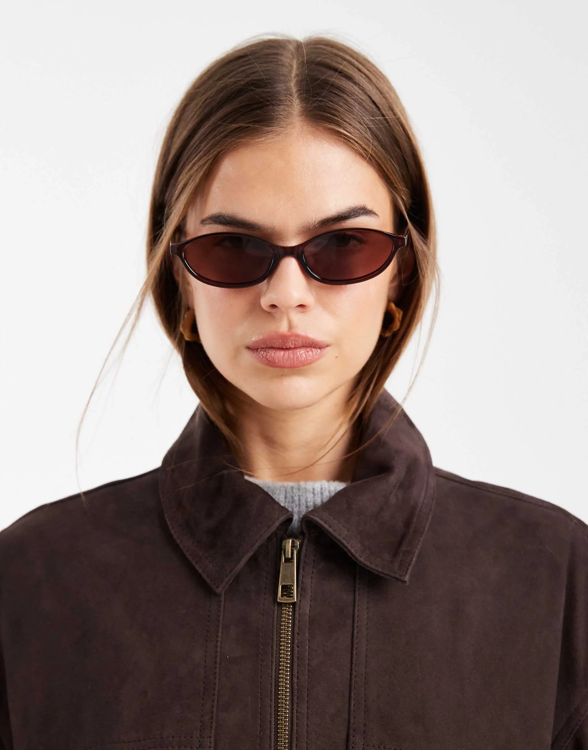 ASOS DESIGN slim oval sunglasses in milky brown