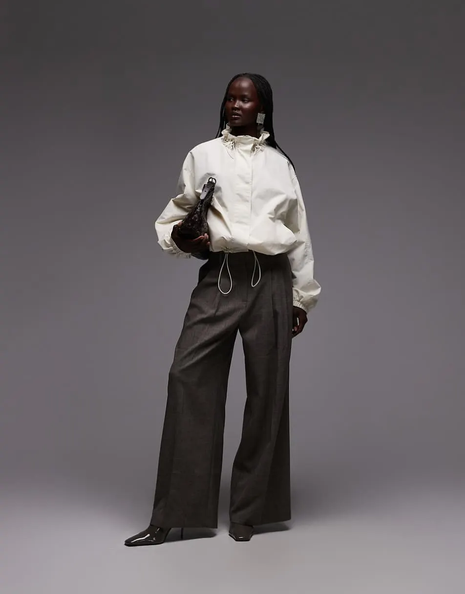 ASOS DESIGN bubble hem nylon track jacket in off white