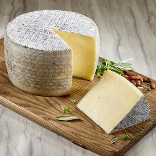 Don Juan Cave Aged Manchego, Aged 4 Months, Full Wheel, Approximately 7 lbs.