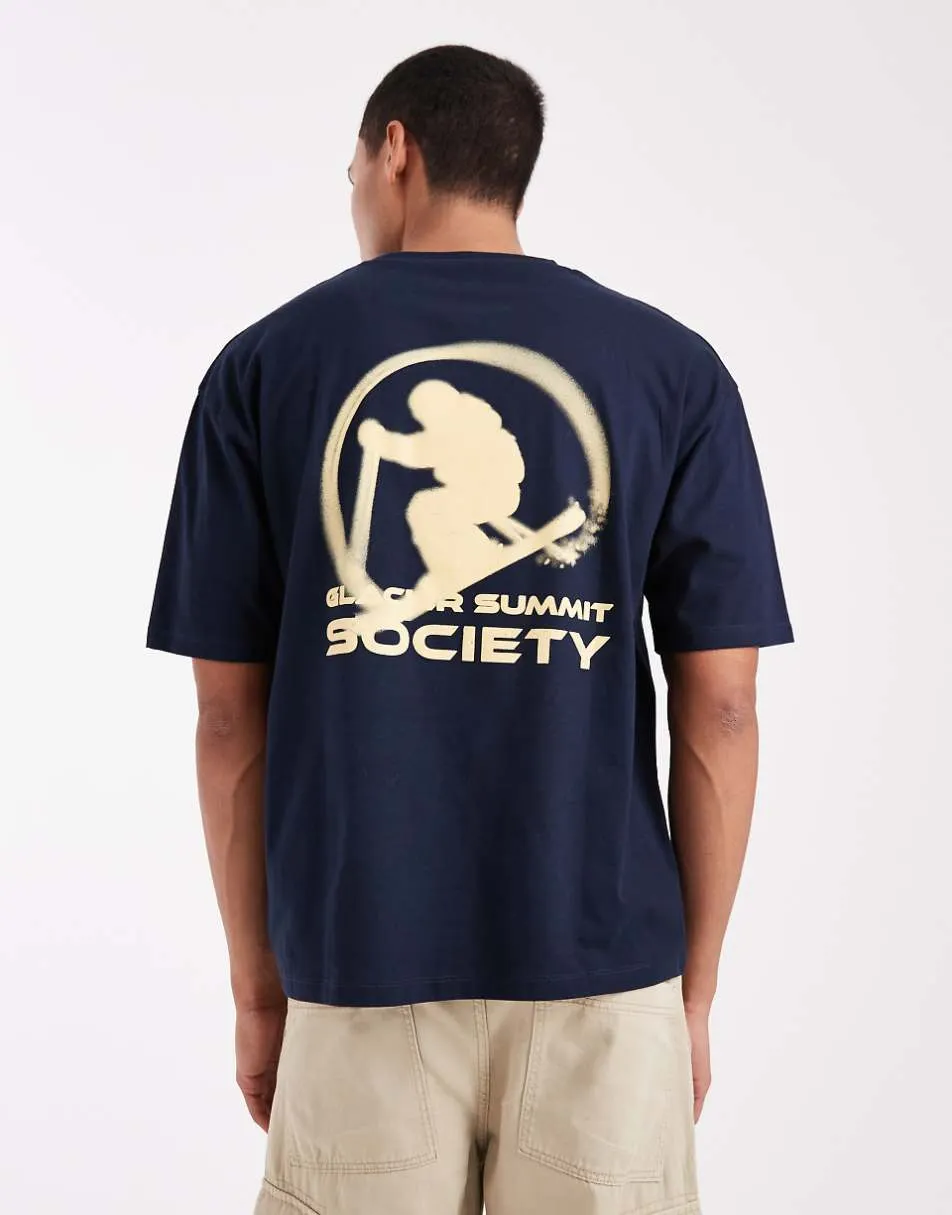 ASOS DESIGN oversized t-shirt with ski sports graphic in navy