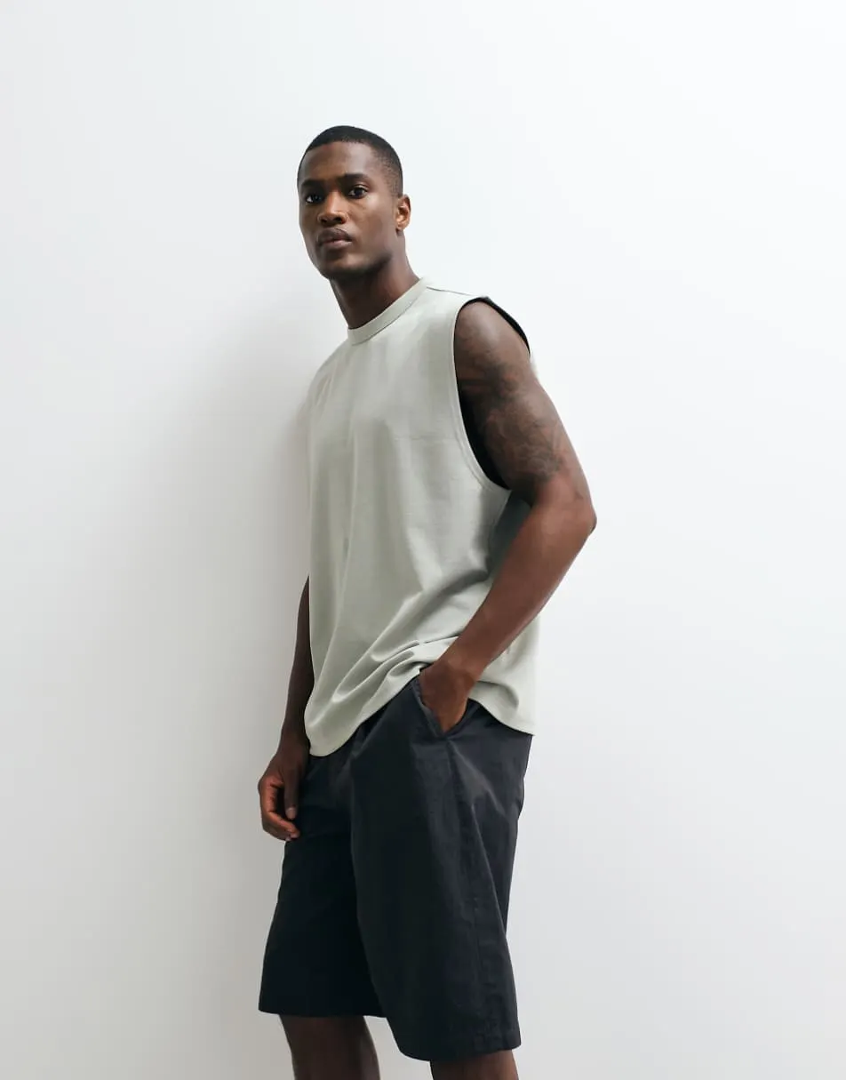 ASOS DESIGN breatheMAX™ heavyweight oversized tank in light green cotton blend