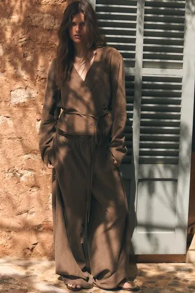 PALAZZO TROUSERS WITH TIE DETAIL