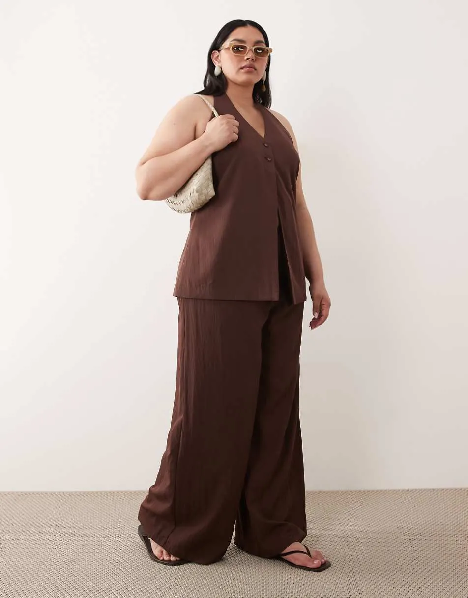ASOS DESIGN Curve Tailored wide leg clean waist floaty trousers in brown