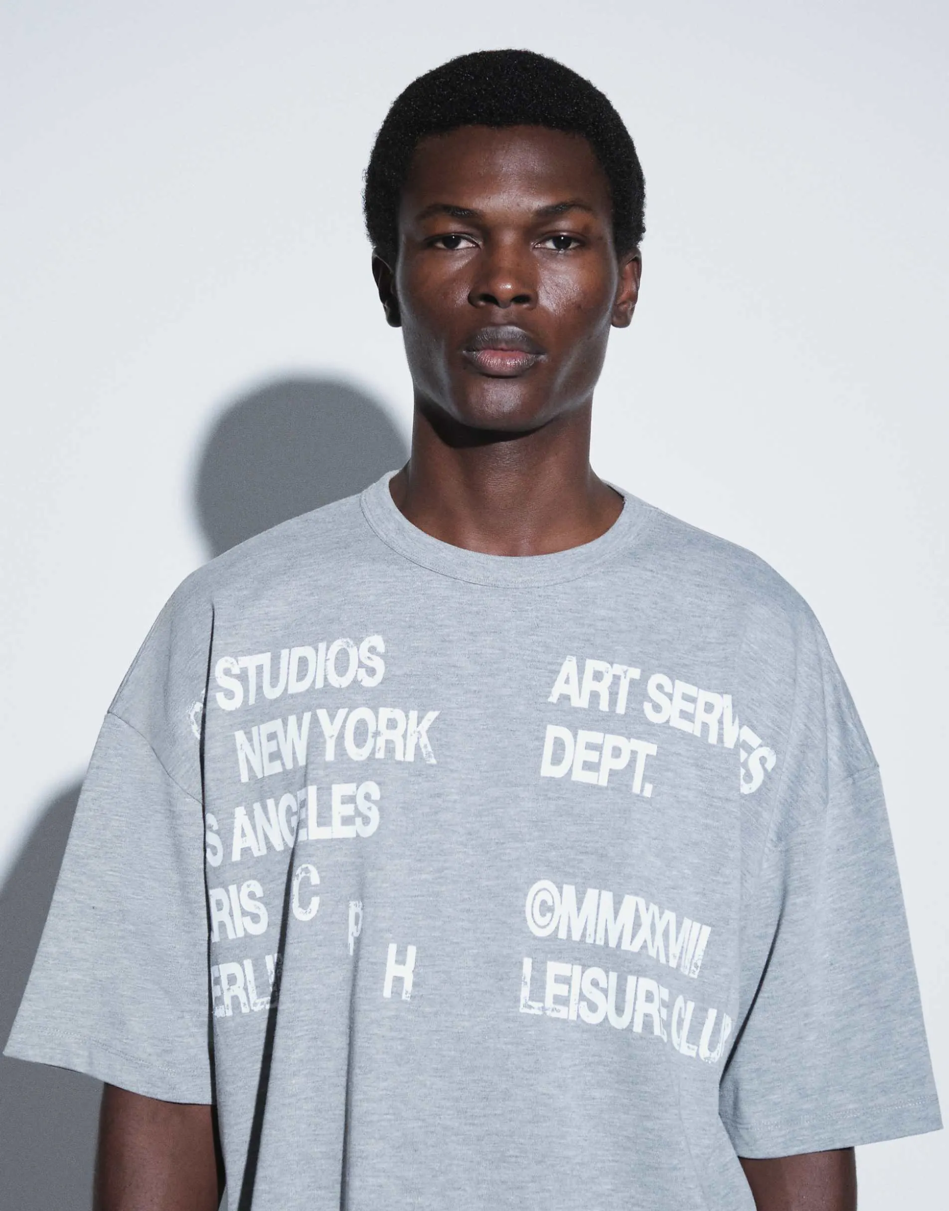 ASOS DESIGN boxy oversized drop shoulder t-shirt with text graphic in grey marl