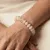 Armband in edelstaal, ovalen kralen