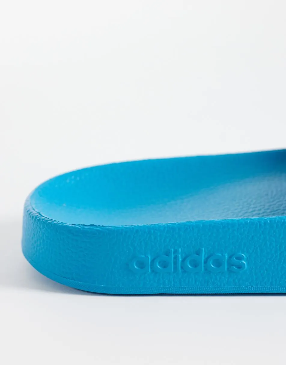 adidas Training Adilette Aqua sliders in blue and white