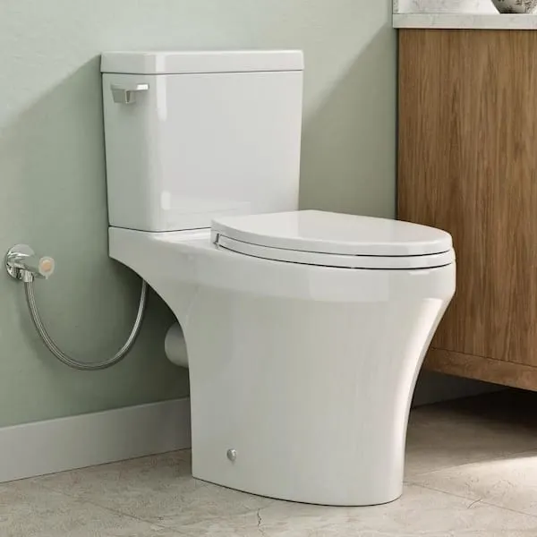 MaceratingFlo Rear Outlet Toilet, 18 in. Tall Skirted and Elongated White Ceramic 2-Piece Toilet, 1.28 GPF, P-Trap, 7 in. Rough-In