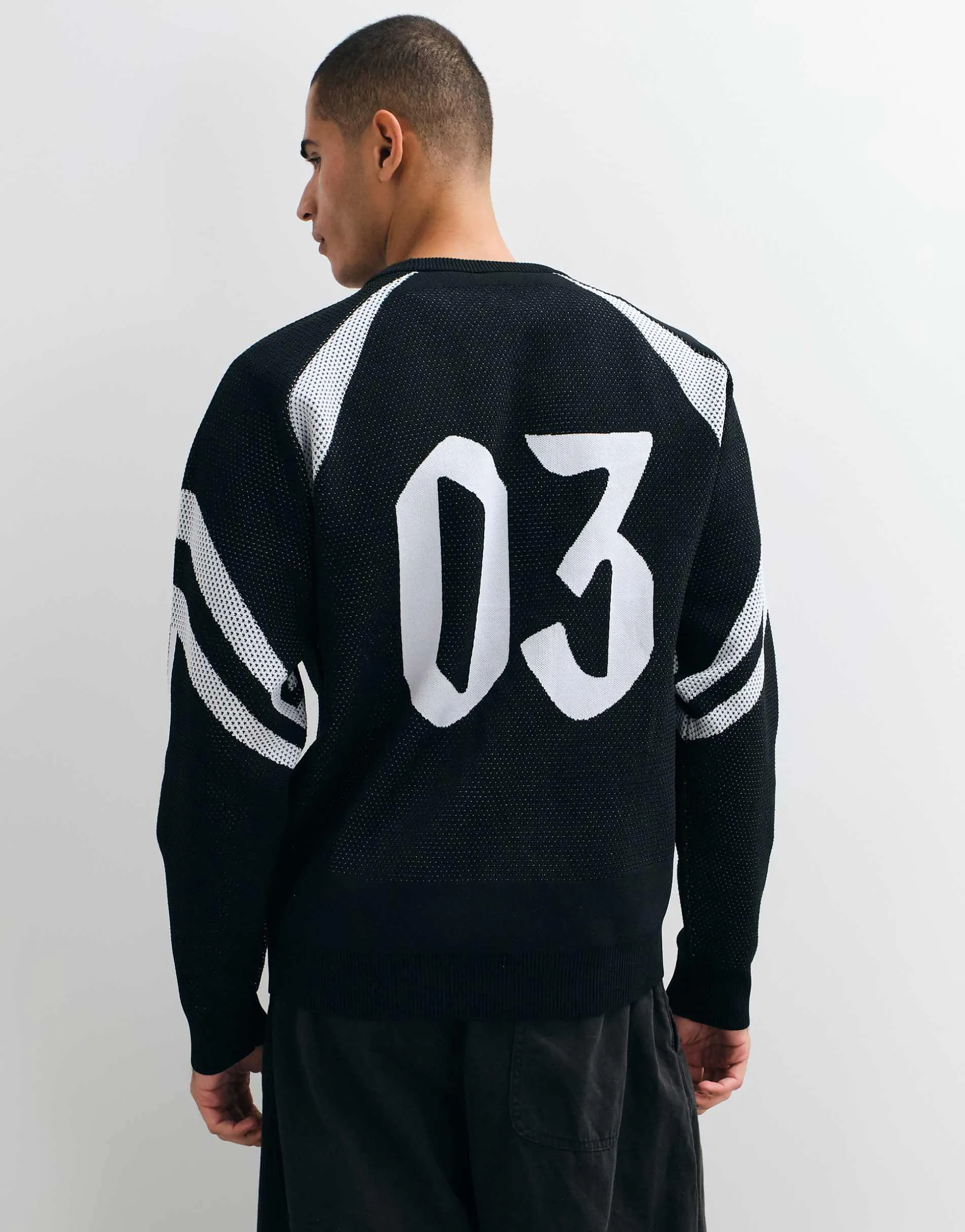 adidas Sportswear knitted logo jumper in black