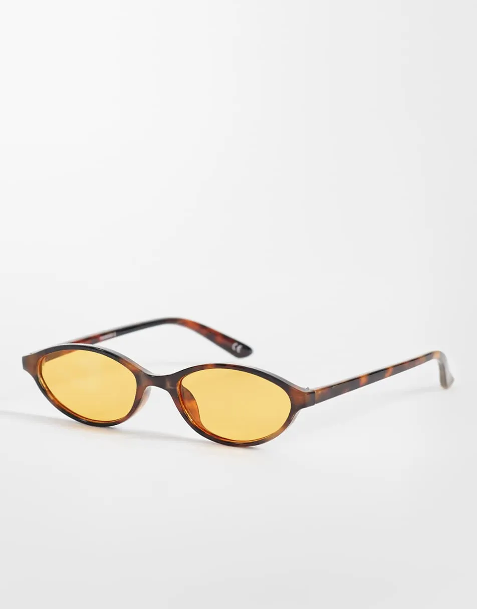 ASOS DESIGN slim oval sunglasses in tort with yellow lens