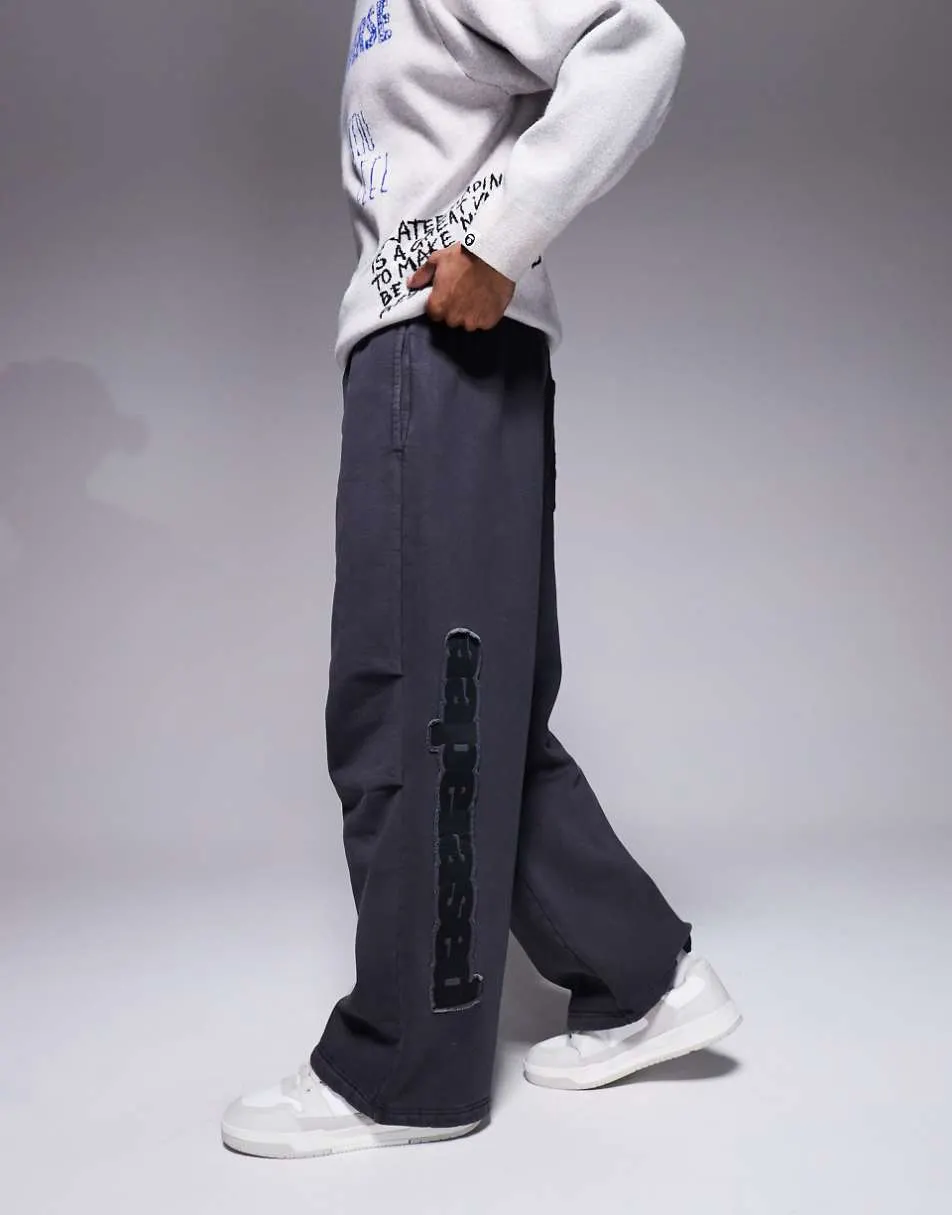 Aape by A Bathing Ape x Erased loose fit heavyweight jersey joggers in washed black