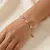Armband in edelstaal, 5 hartjes