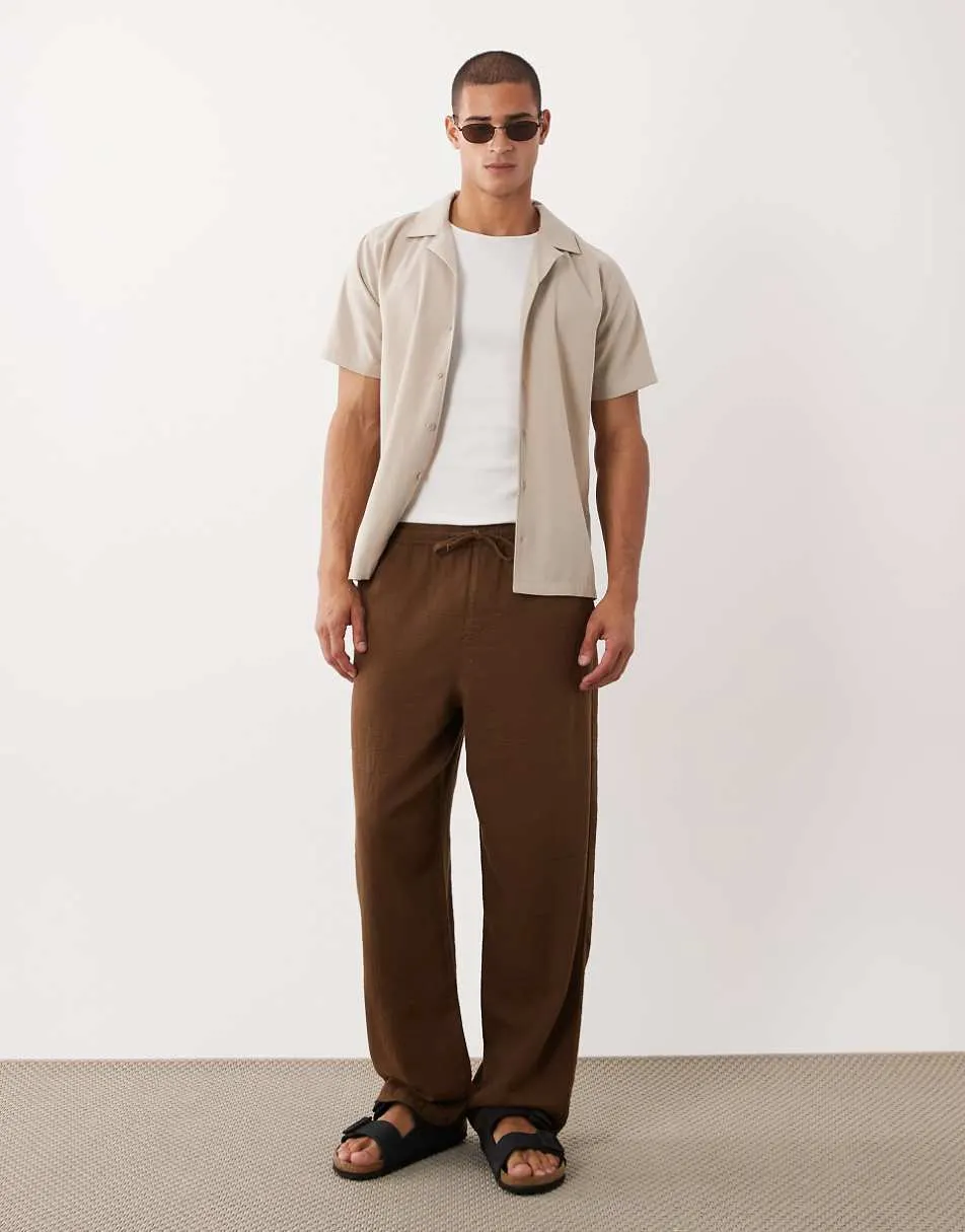 ASOS DESIGN loose straight textured trousers in brown with elasticated waistband