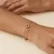 Armband in goudkleurig edelstaal, bloem