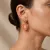 Oorbel in high fashion, grote ovale vorm