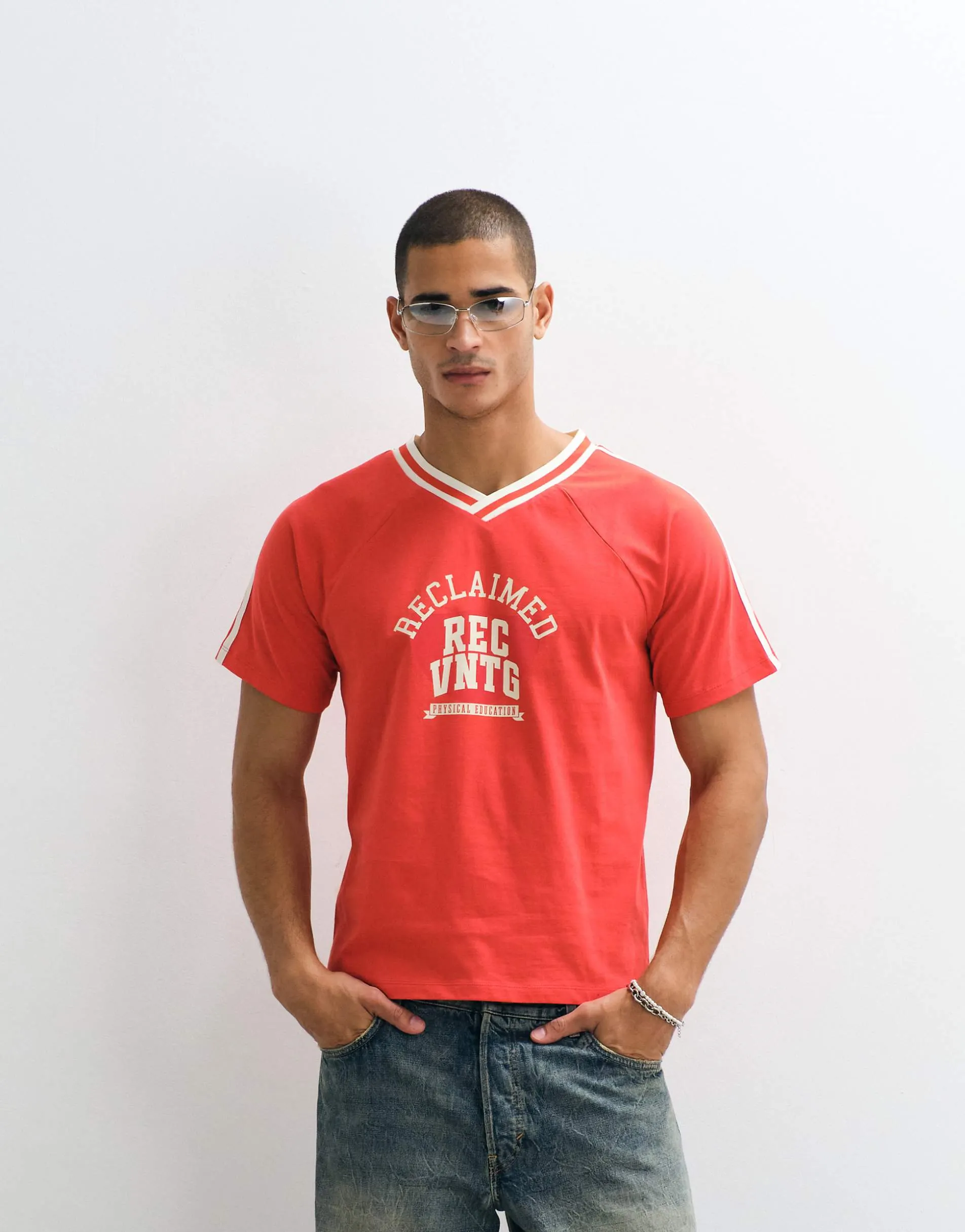 Reclaimed Vintage v-neck collegiate graphic t-shirt in red