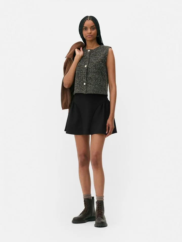 Mini-jupe évasée en crêpe