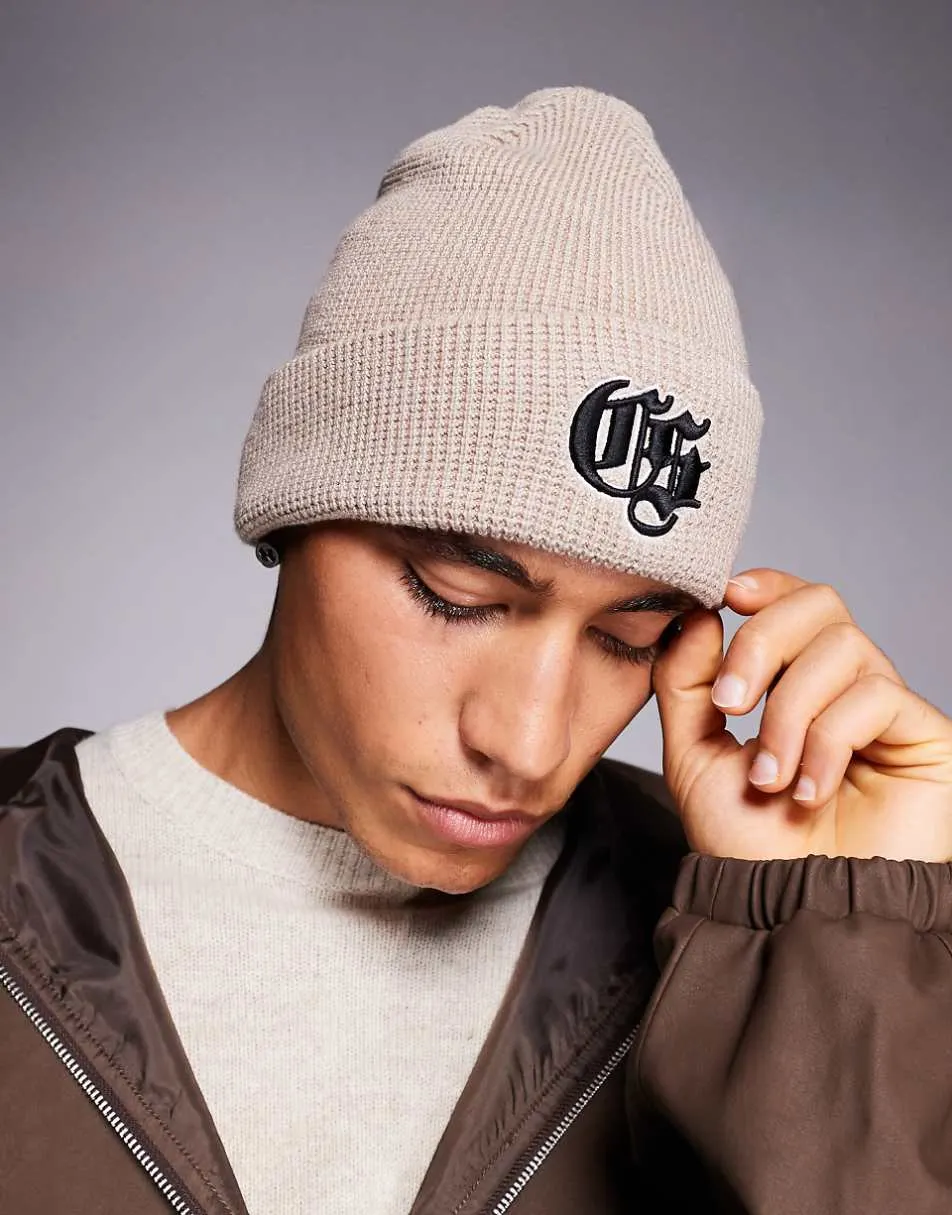 River Island logo detail waffle beanie in light stone