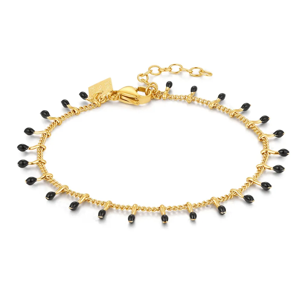 Armband in edelstaal, zwarte druppeltjes