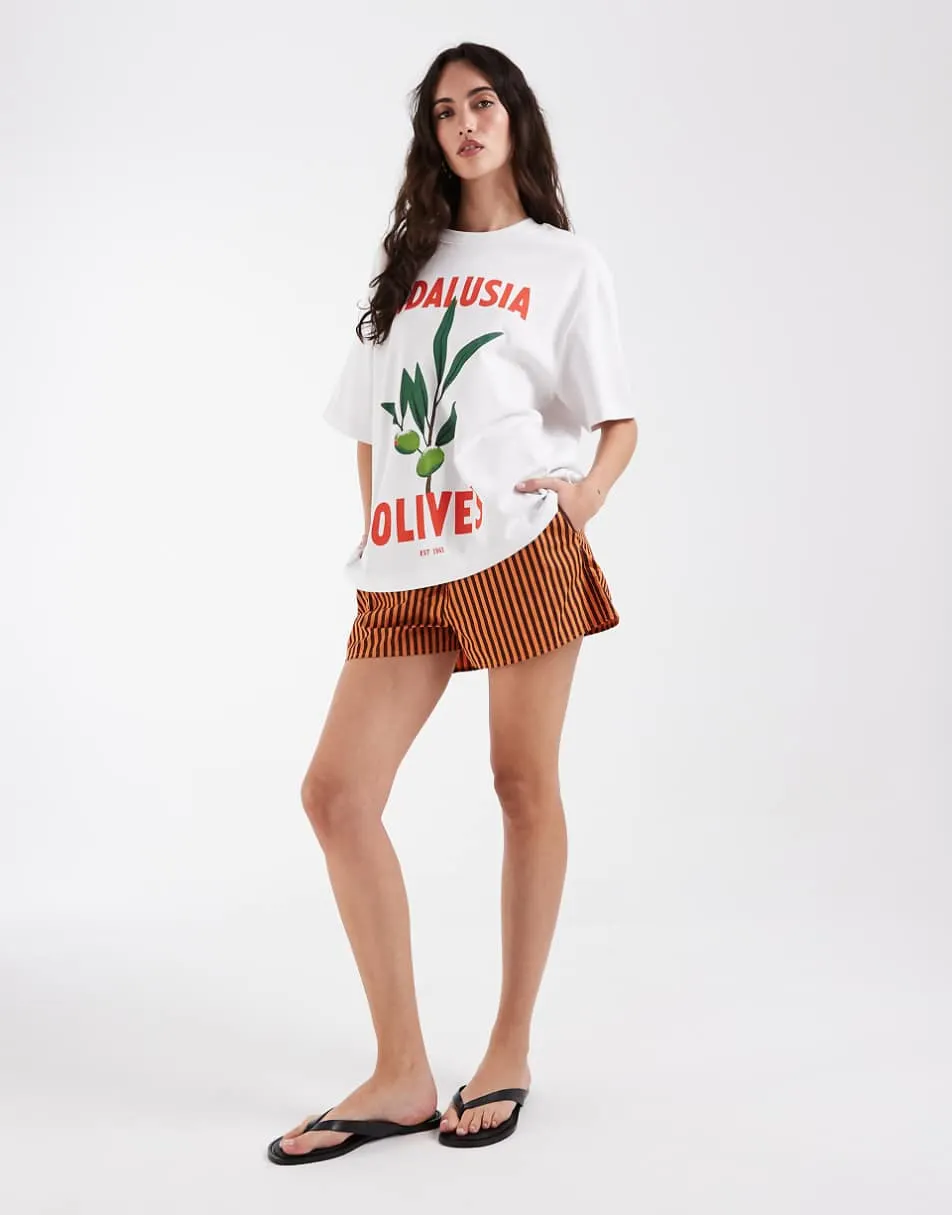 ASOS DESIGN oversized tee with olive graphic in white