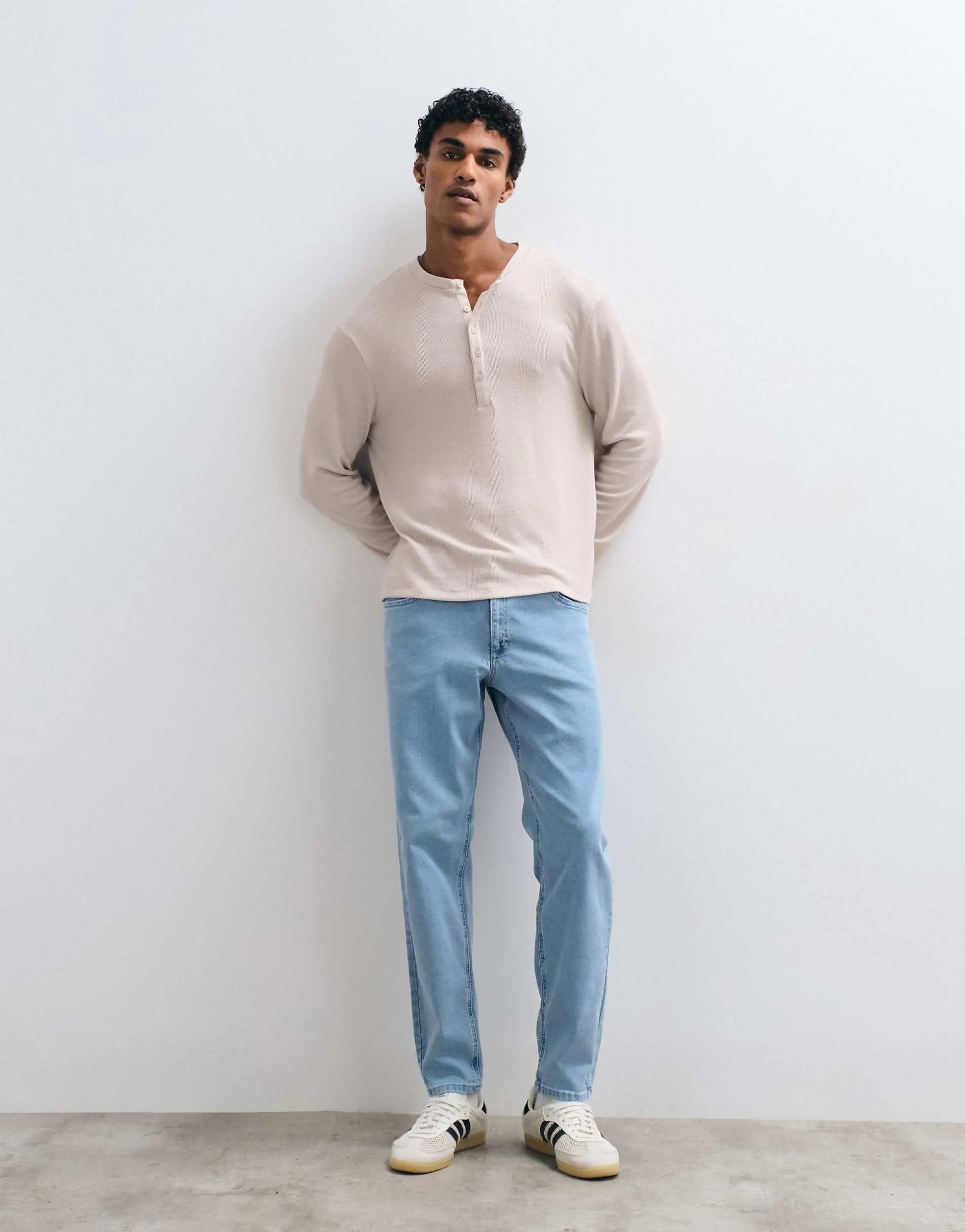 ASOS DESIGN stretch tapered jeans in light stone wash blue