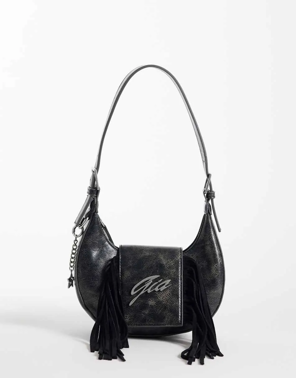 I.AM.GIA Tia textured faux leather chrome logo detail fringe front adjustable shoulder bag in washed black
