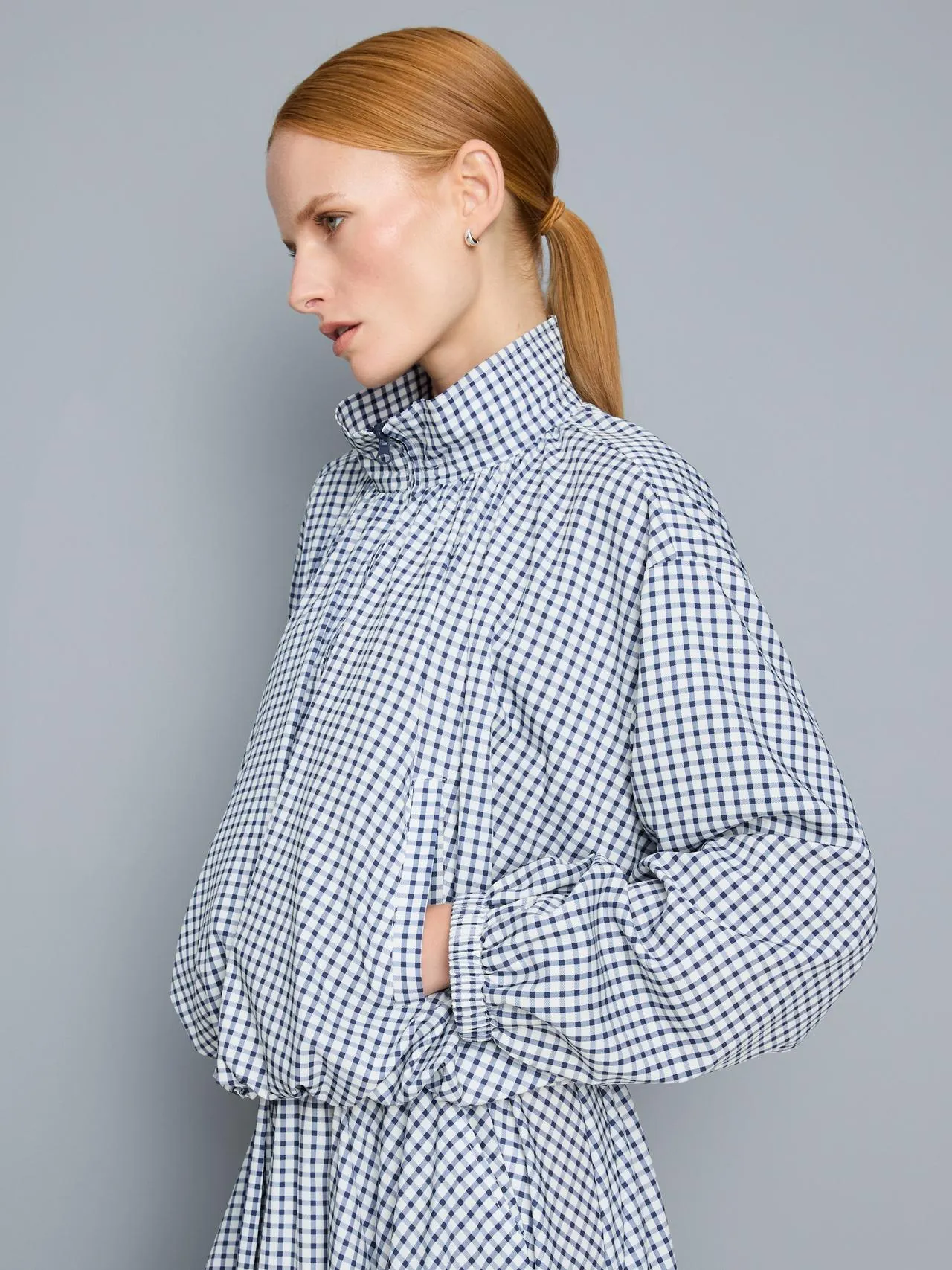 Giacca bomber tecnica con collo a imbuto