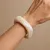 Armband in ecru