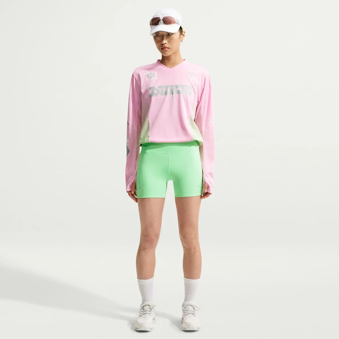 Tettsittende løpeshorts (8 cm) med høyt liv og lommer til dame