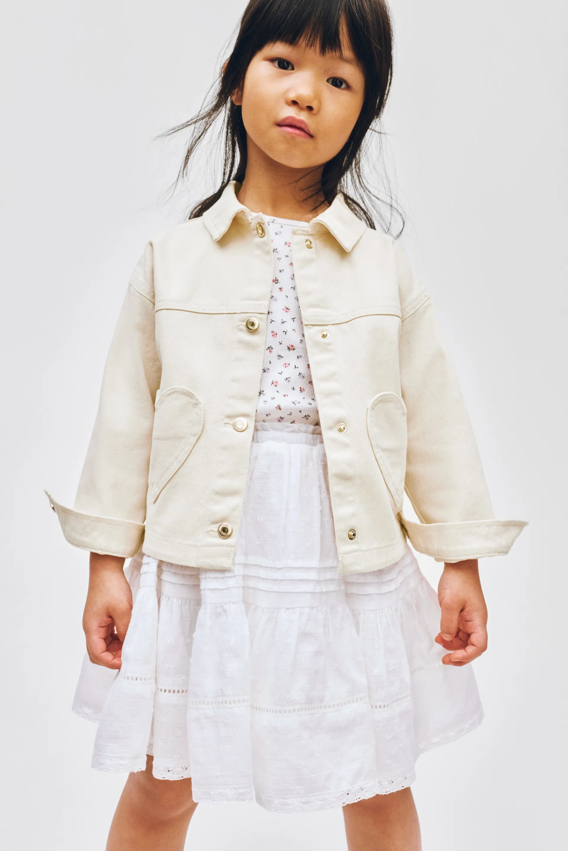 Chamarra de sarga con bolsillos de corazón