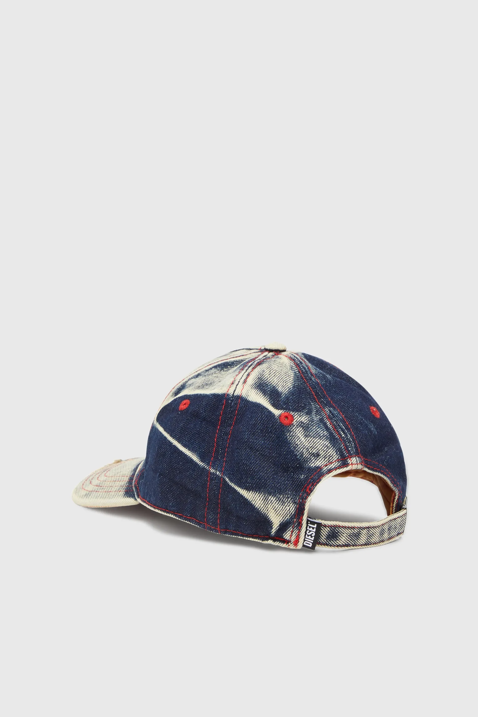 Baseball cap in treated denim