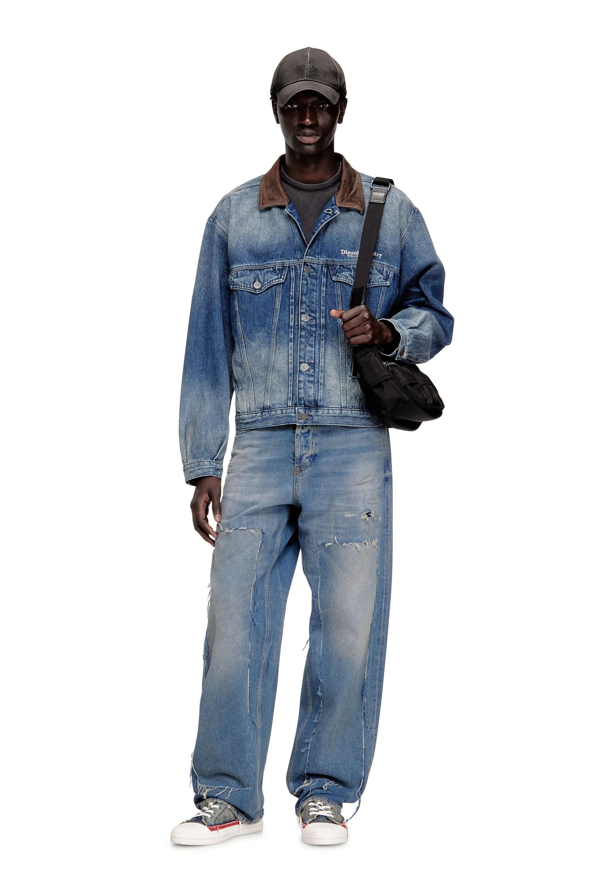 Denim trucker jacket with contrast leather trims