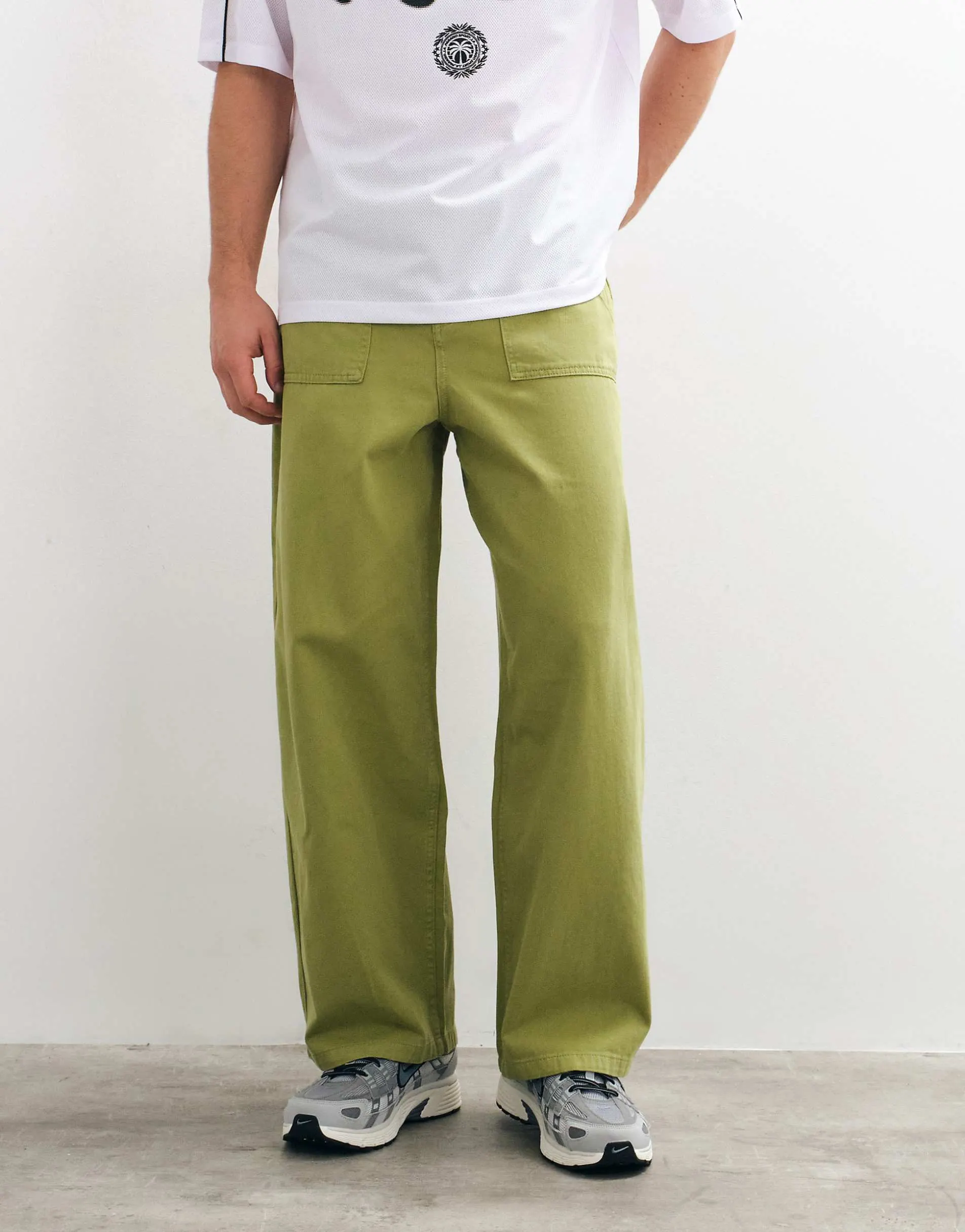 ASOS DESIGN barrel trousers in olive with fatigue pockets
