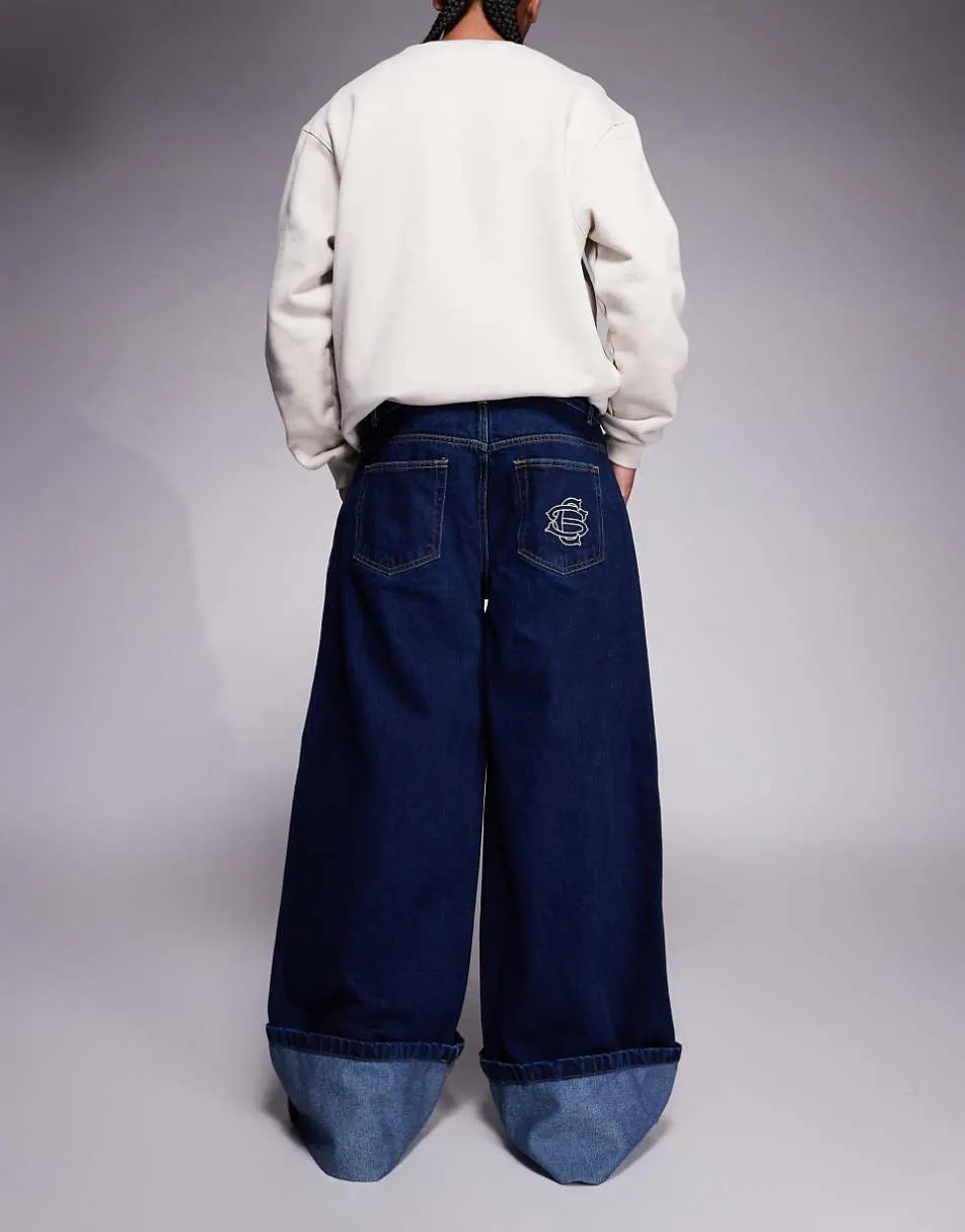 Courtside oversized jeans in darkwash blue with turn up hem