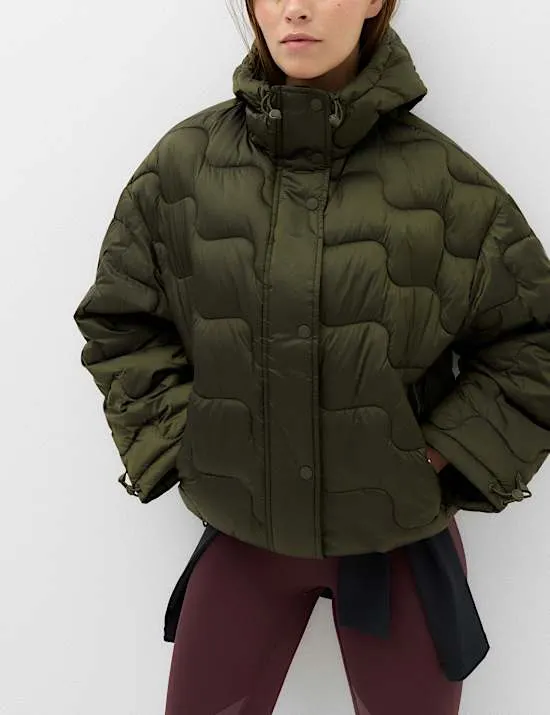 Stormwear™ Gesteppte Pufferjacke mit Kapuze