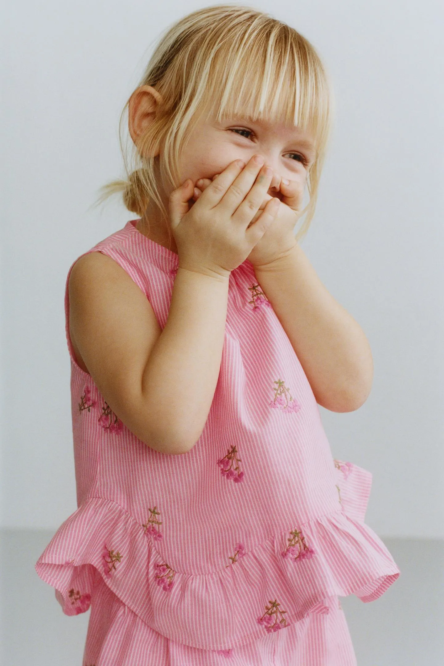 STRIPED TOP WITH EMBROIDERED FLOWERS