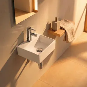 Lavabo suspendido de porcelana blanca RONDA 335x290x115 mm.